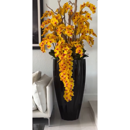 Orquídeas amarillas en cascada en maceta San Jose negra de alto brillo