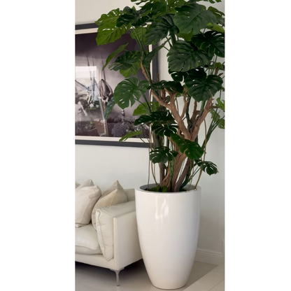 Monstera artificial en maceta blanca de alto brillo