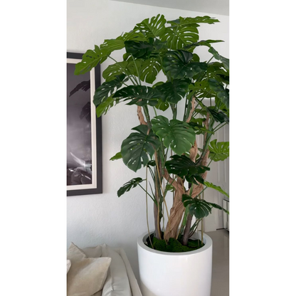 Monstera artificial en maceta blanca de alto brillo
