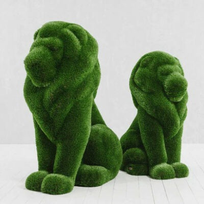 León sentado de pasto artificial – Figura topiaria