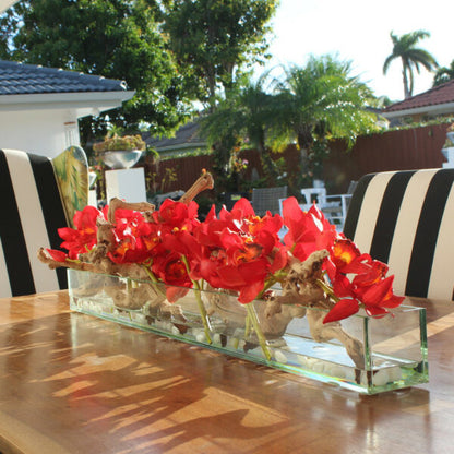 Jardinera moderna de vidrio Modern Home de 122 cm con orquídeas Cymbidium rojas