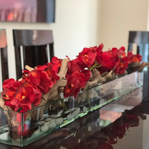 Jardinera moderna de vidrio Modern Home de 122 cm con orquídeas Cymbidium rojas